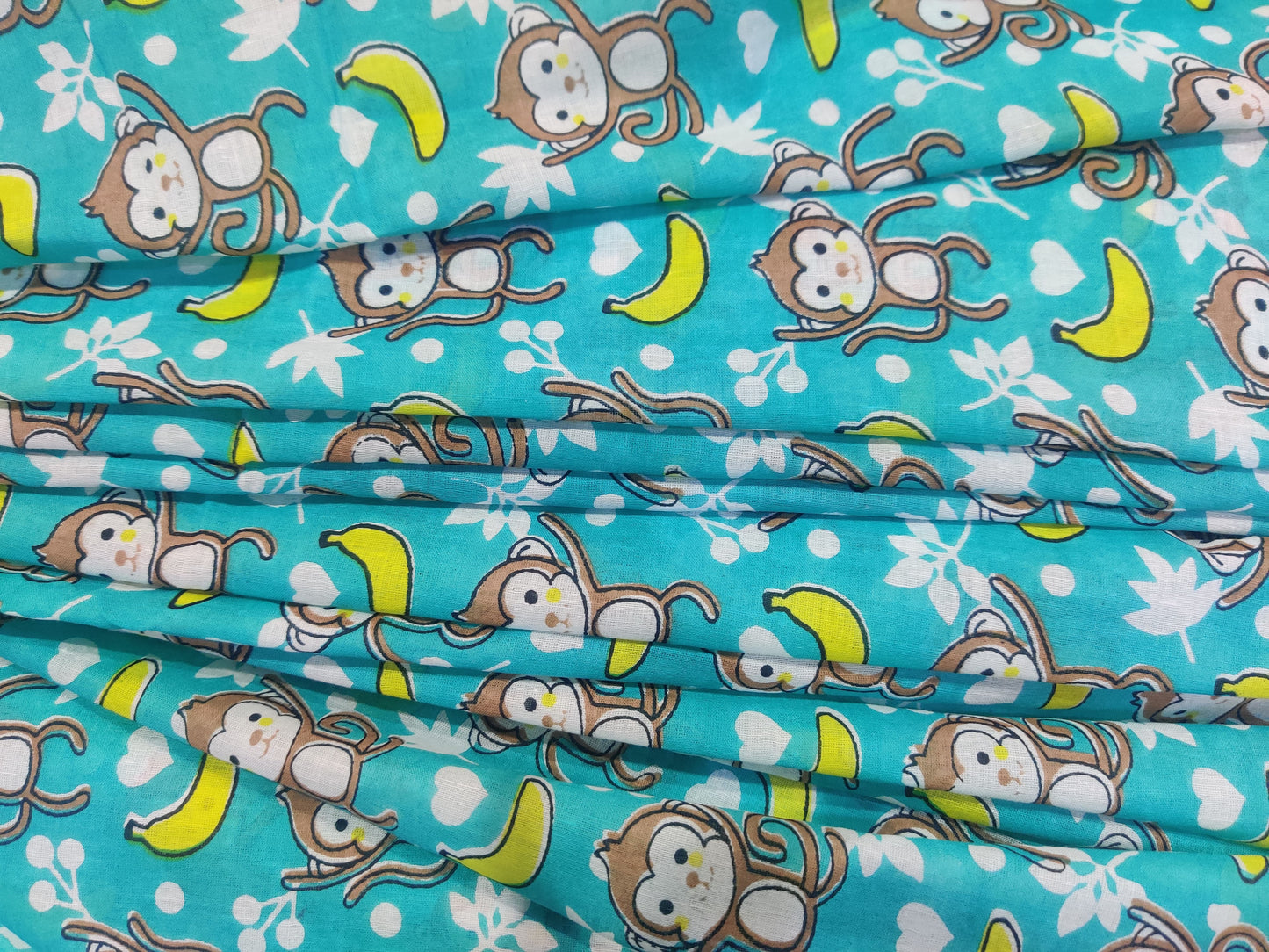 Organic Soft Cotton- Go bananas with this playful monkey pattern saree